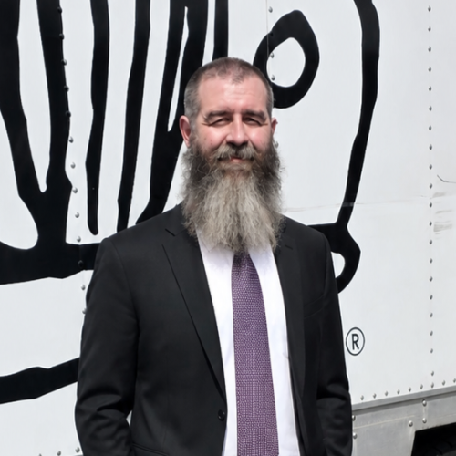 Standing in front of truck