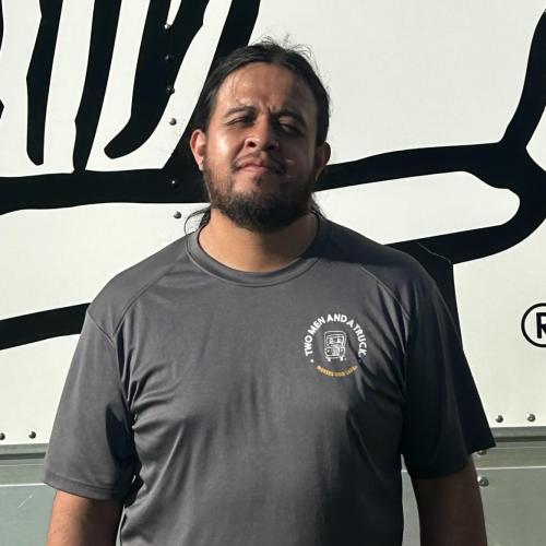 Mover against TMT Moving Truck background