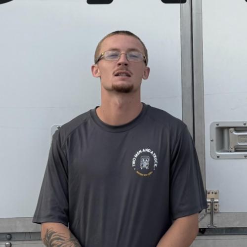 Mover against TMT Moving Truck background