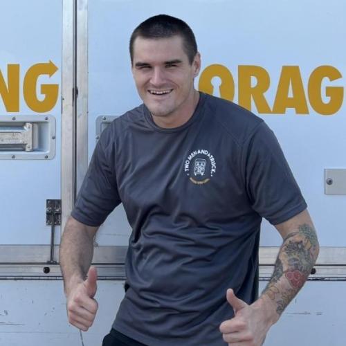 Mover against TMT Moving Truck background