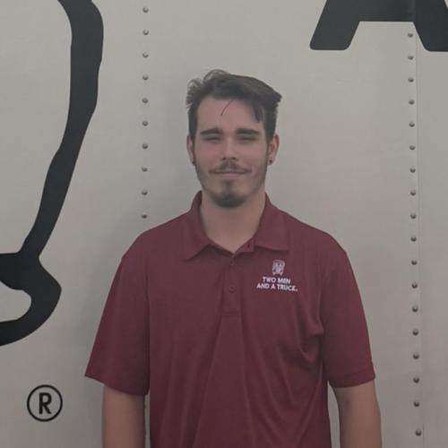 Kane in front of truck