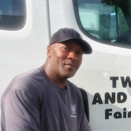 Jeffery in front of a truck