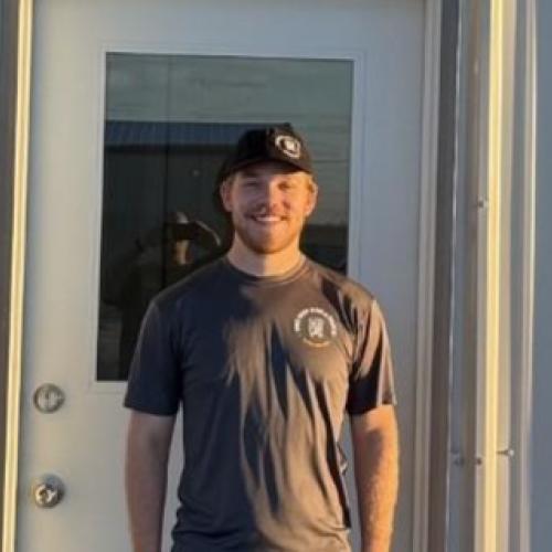 Ben standing in front of our office