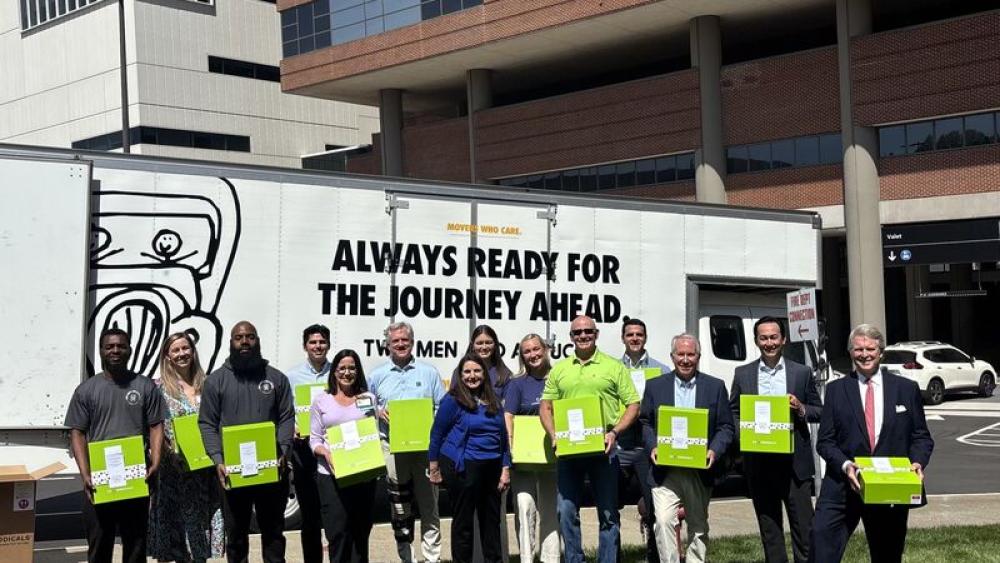 Cheeriodicals and Captrust Team Delivering boxes at a Hospital in Winston Salem