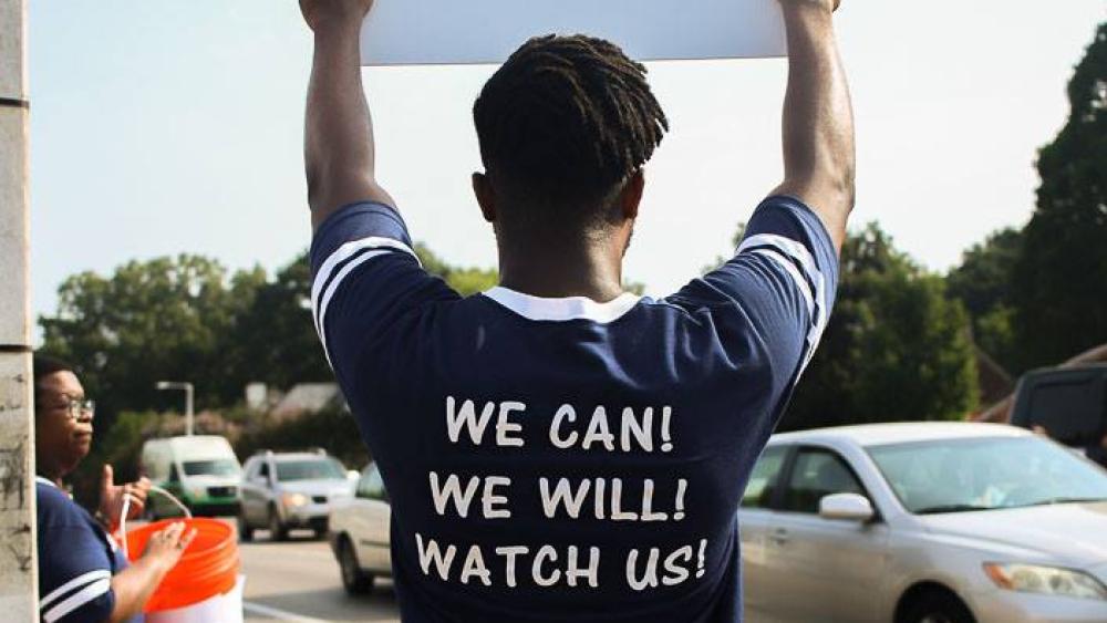 sign and shirt