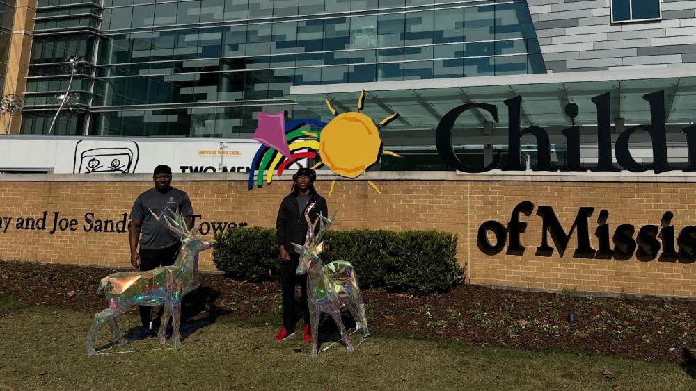Movers in front of Friends of Children's Hospital