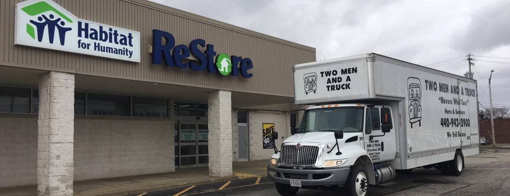 Two Men And A Truck in front of the Habitat for Humanity ReStore in Eastlake