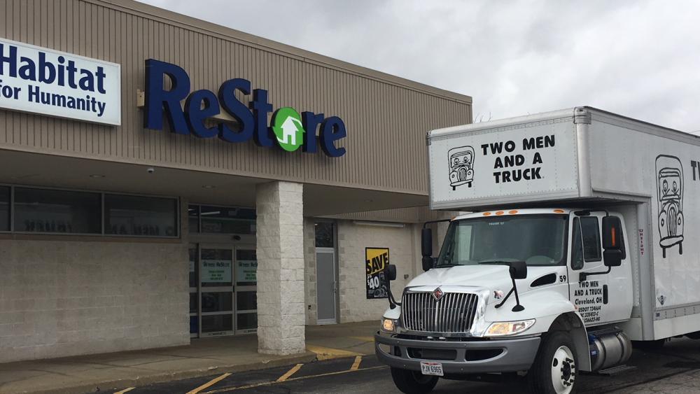 Two Men And A Truck in front of the Habitat for Humanity ReStore in Eastlake