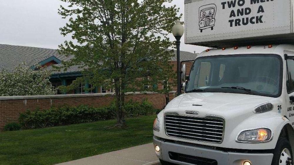 Two Men And A Truck delivering to First Step Shelter.