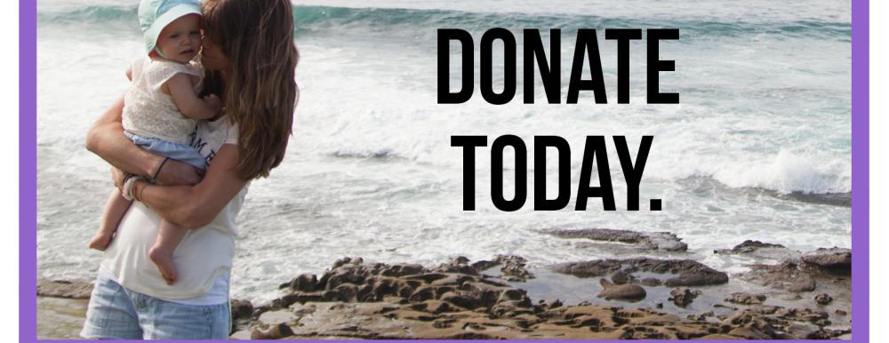 A mother holding her child with the words "donate today" in the foreground