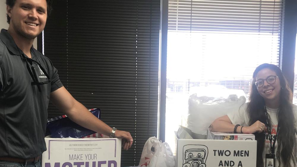 A mover dropping off donations to the YWCA