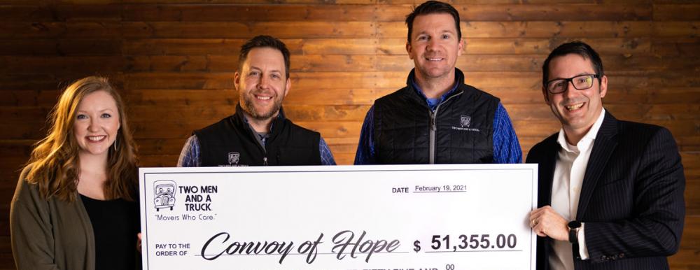 Two Men And A Truck and Convoy of Hope Check Presentation