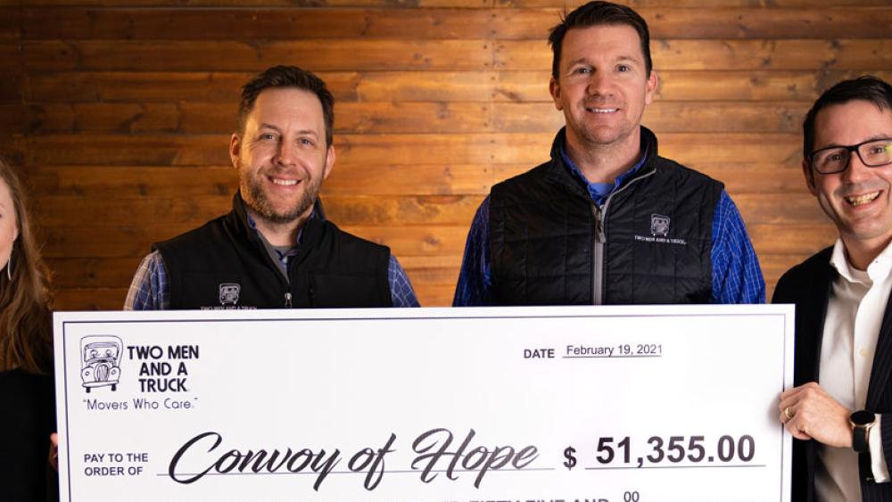 Two Men And A Truck and Convoy of Hope Check Presentation