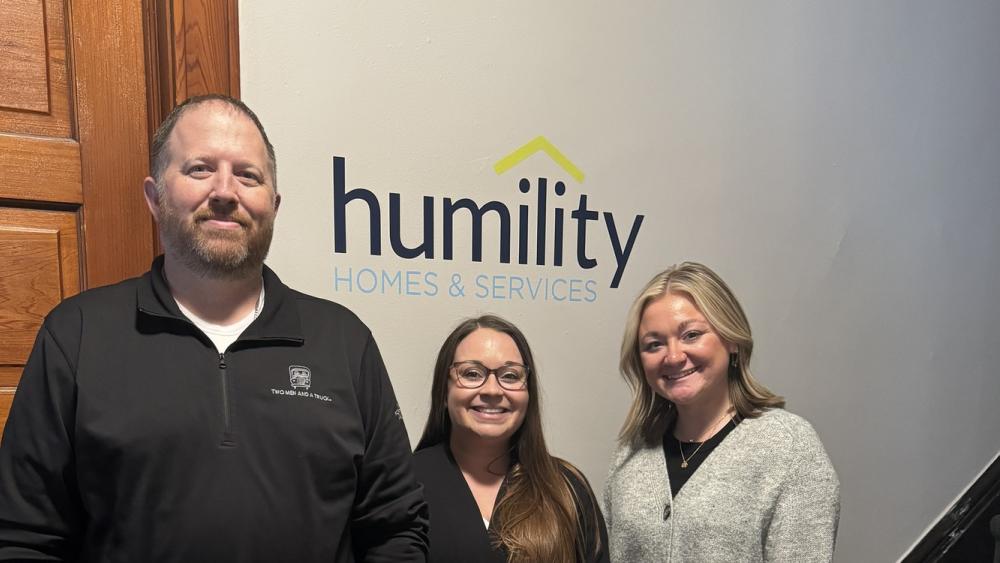 humility homes and services picture with quad cities two men and a truck employees