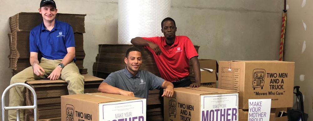 two men and a truck movers for moms team photo sugar land