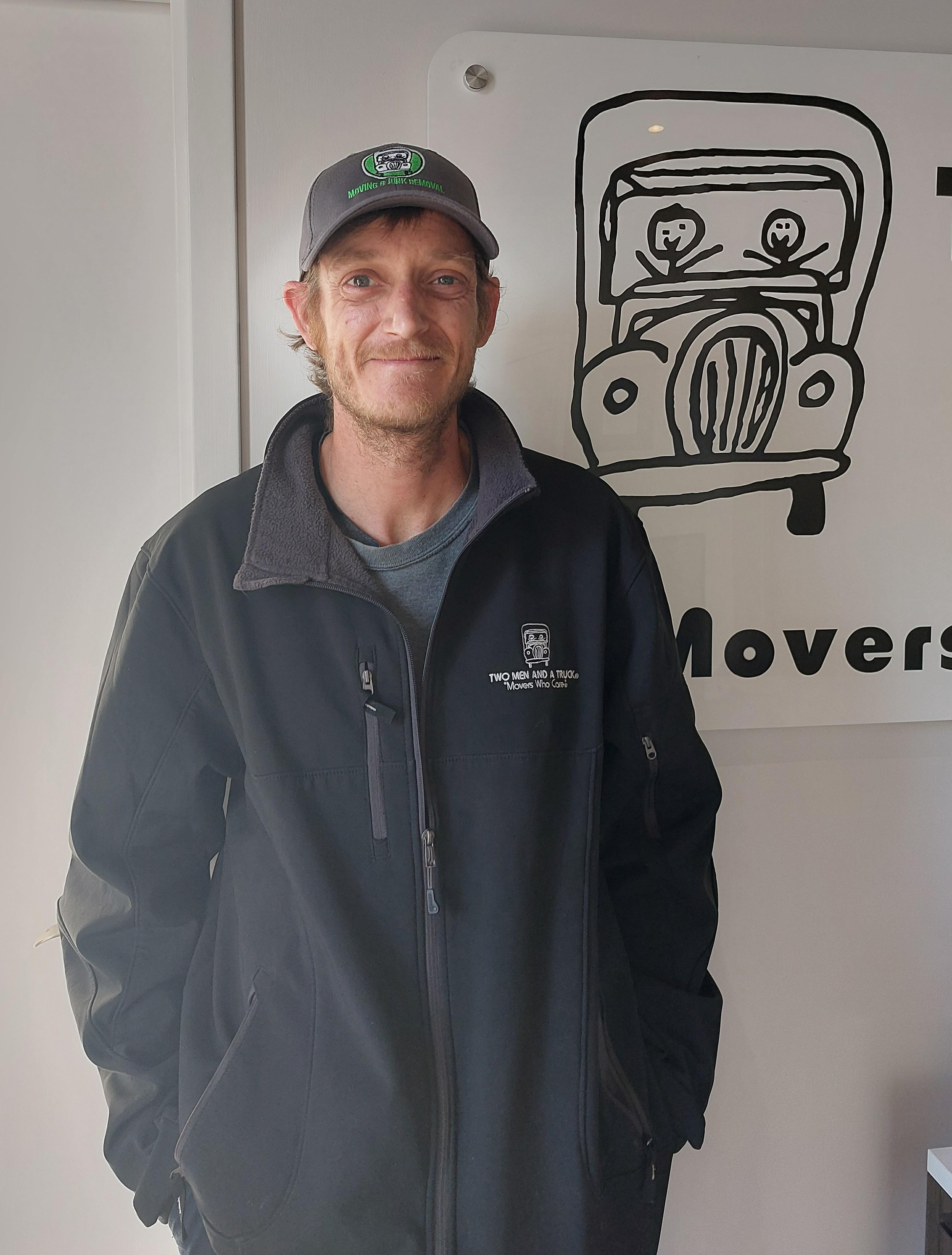 logo for movers for mutts charity in st. petersburg