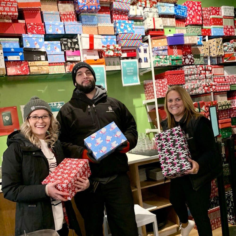 The "Movers Who Care" making sure kids are happy Christmas Morning!