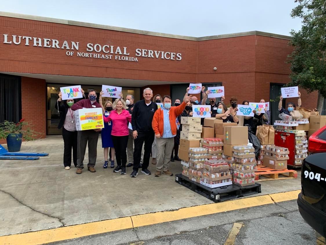Two Men And A Truck donates food to Lutheran Social Services of Northeast Florida