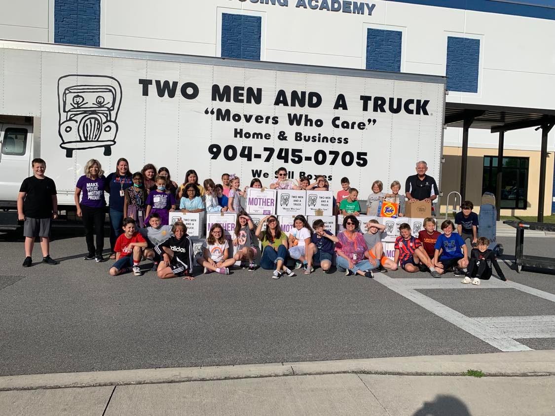 Two Men And A Truck Partners with Freedom Crossing Academy for Movers for Moms