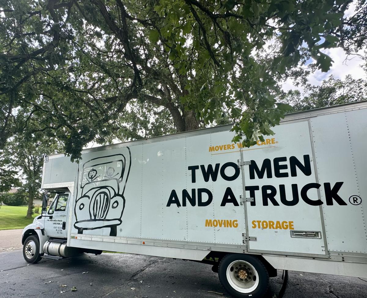 two men and a truck moving truck in freeport