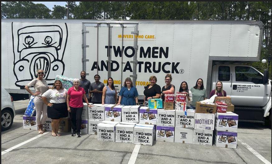 TWO MEN AND A TRUCK® team delivering Movers for Moms® donations to Betty Griffin Center in St. Johns County, FL