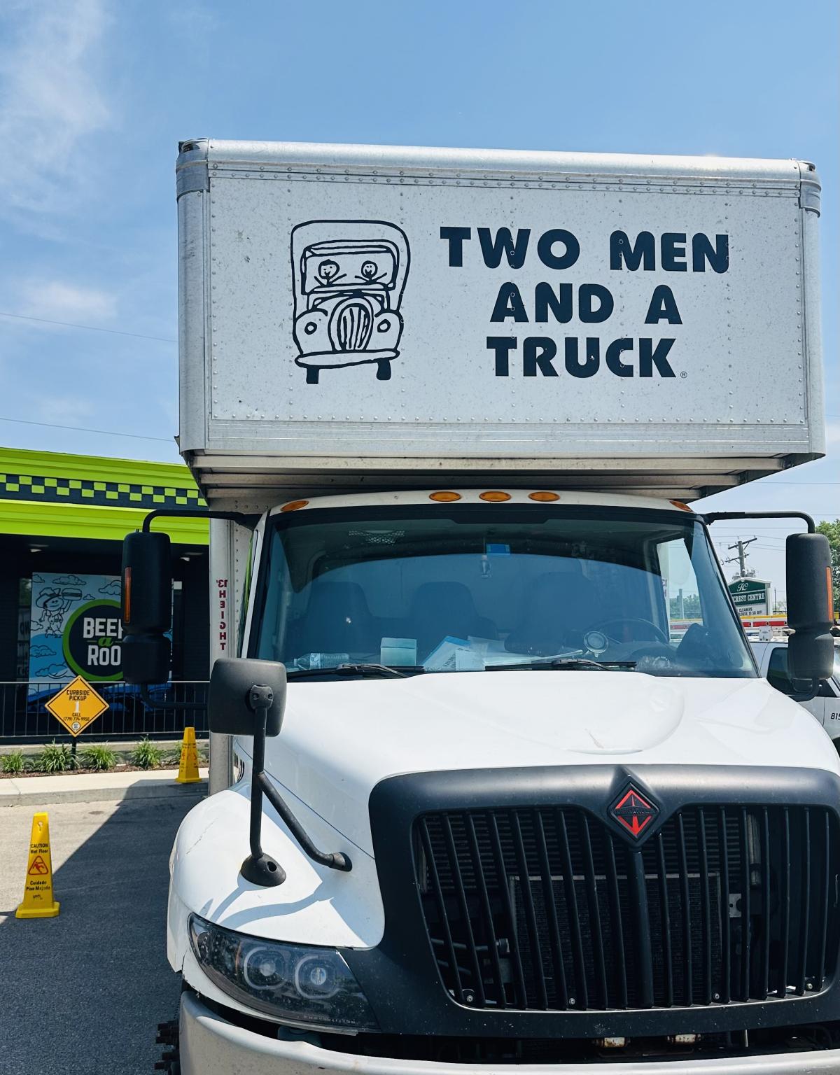 Here is a picture of our TWO MEN AND A TRUCK moving truck at a business move in Freeport, IL