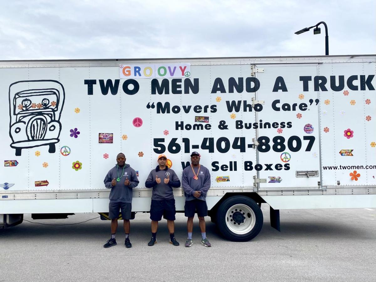 Two Men And A Truck movers decorated truck for the 2026 Keeper Days Parade in Lighthouse Point