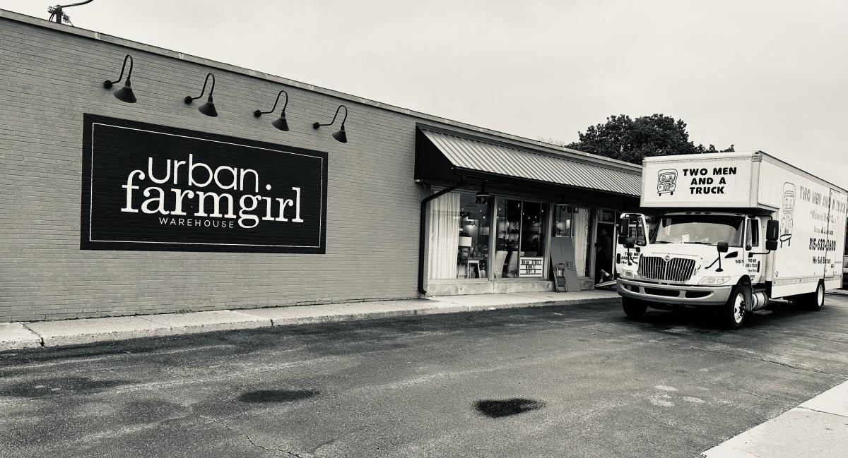 TWO MEN AND A TRUCK MOVERS AT URBAN FARMGIRL HELPING TO MOVE ITEMS