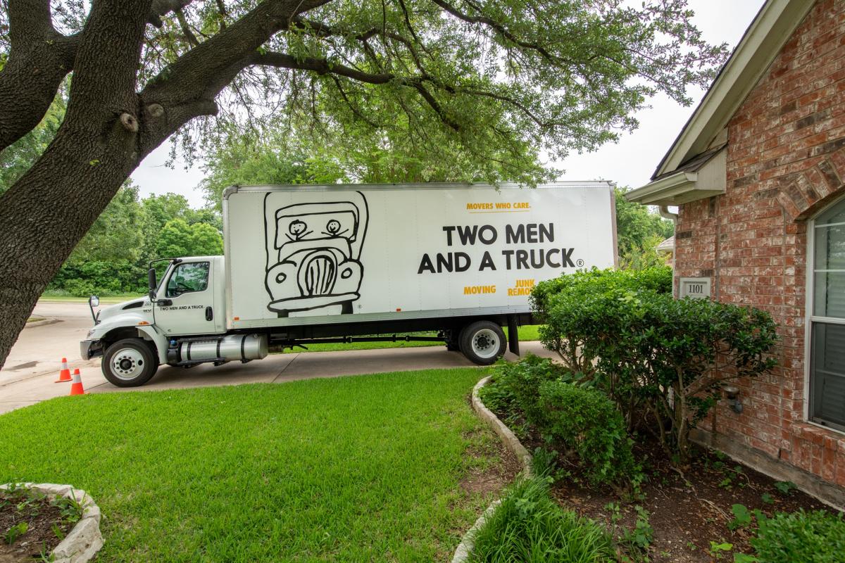 TWO MEN AND A TRUCK moving truck at customer home