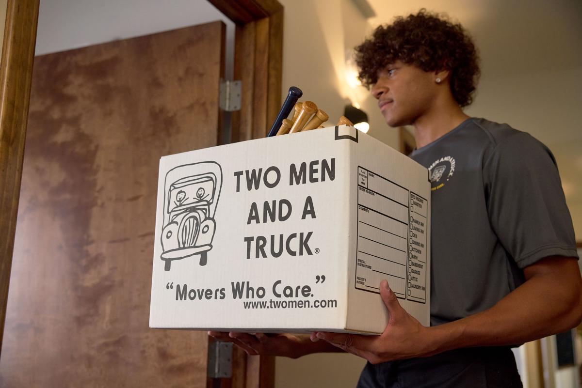 Mover carrying a moving box