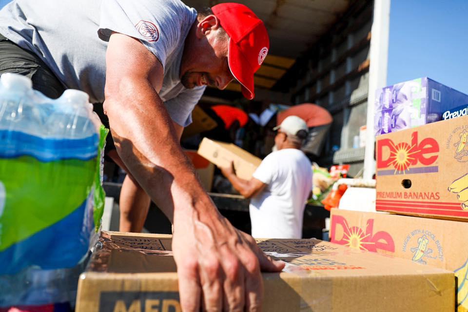 Volunteers from Convoy of Hope load a truck with supplies for The Bahamas after Hurricane Dorian