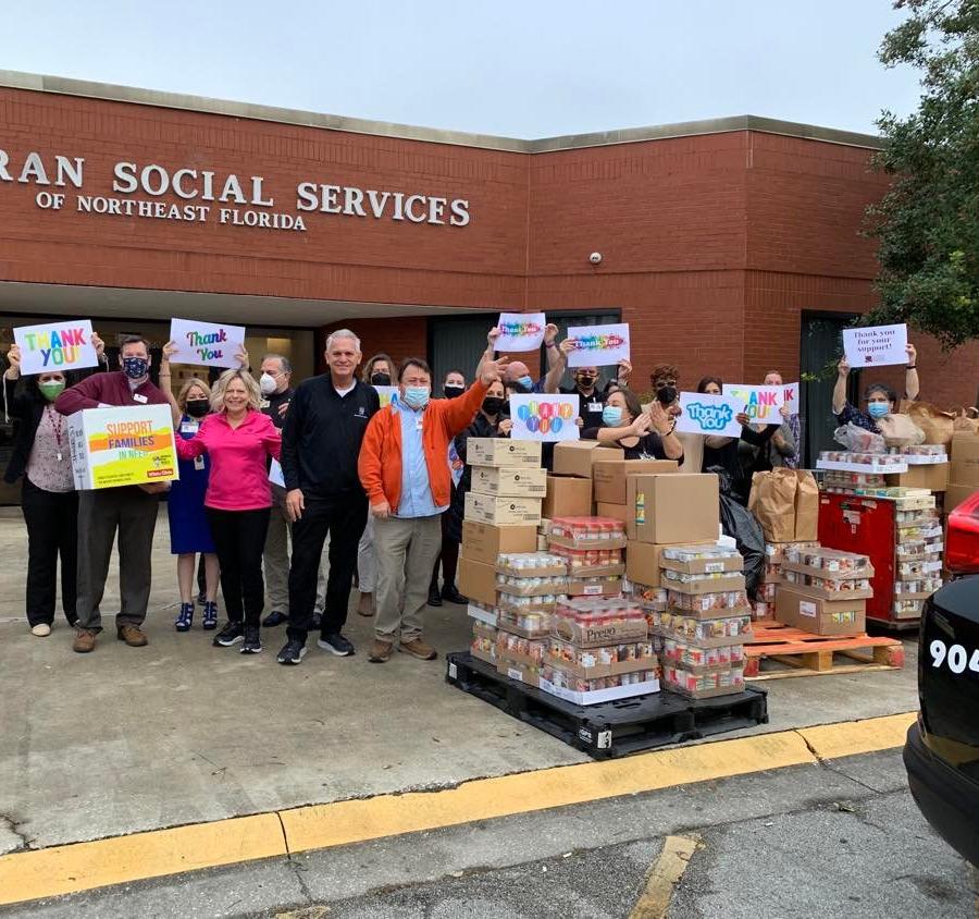 Two Men And A Truck donates food to Lutheran Social Services of Northeast Florida