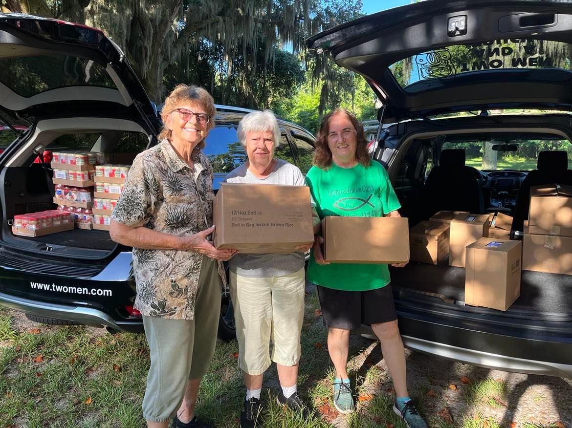 Two Men And A Truck donates food to Giving Hearts Ministry Food Pantry
