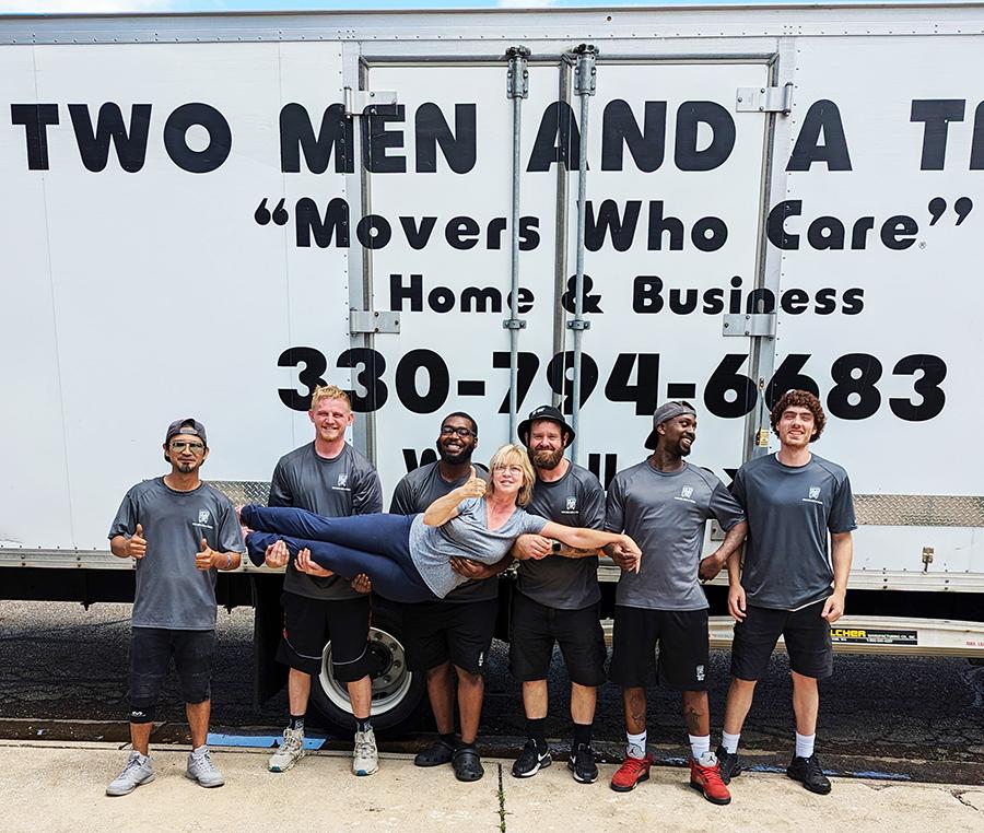 Movers holding up a customer 