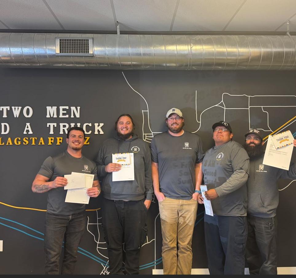 flagstaff team holding certificates