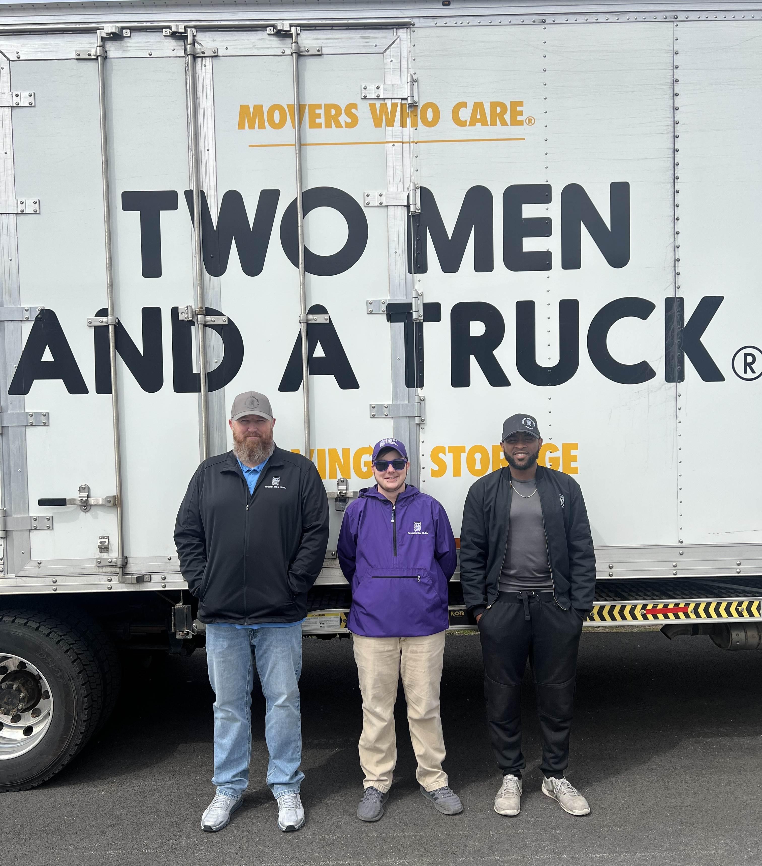 quad cities movers infront of truck 