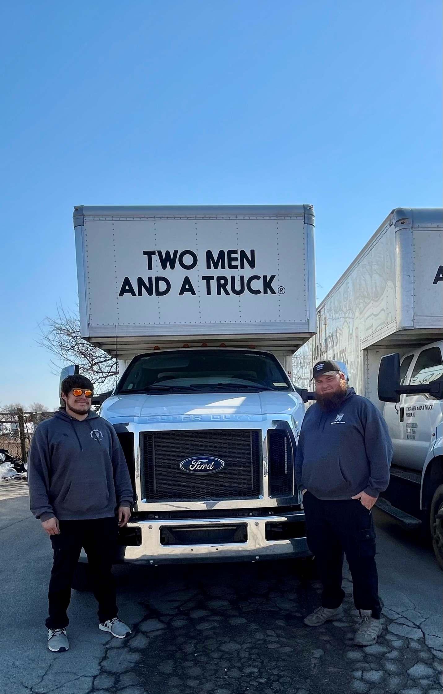 peoria pic infront of truck with movers
