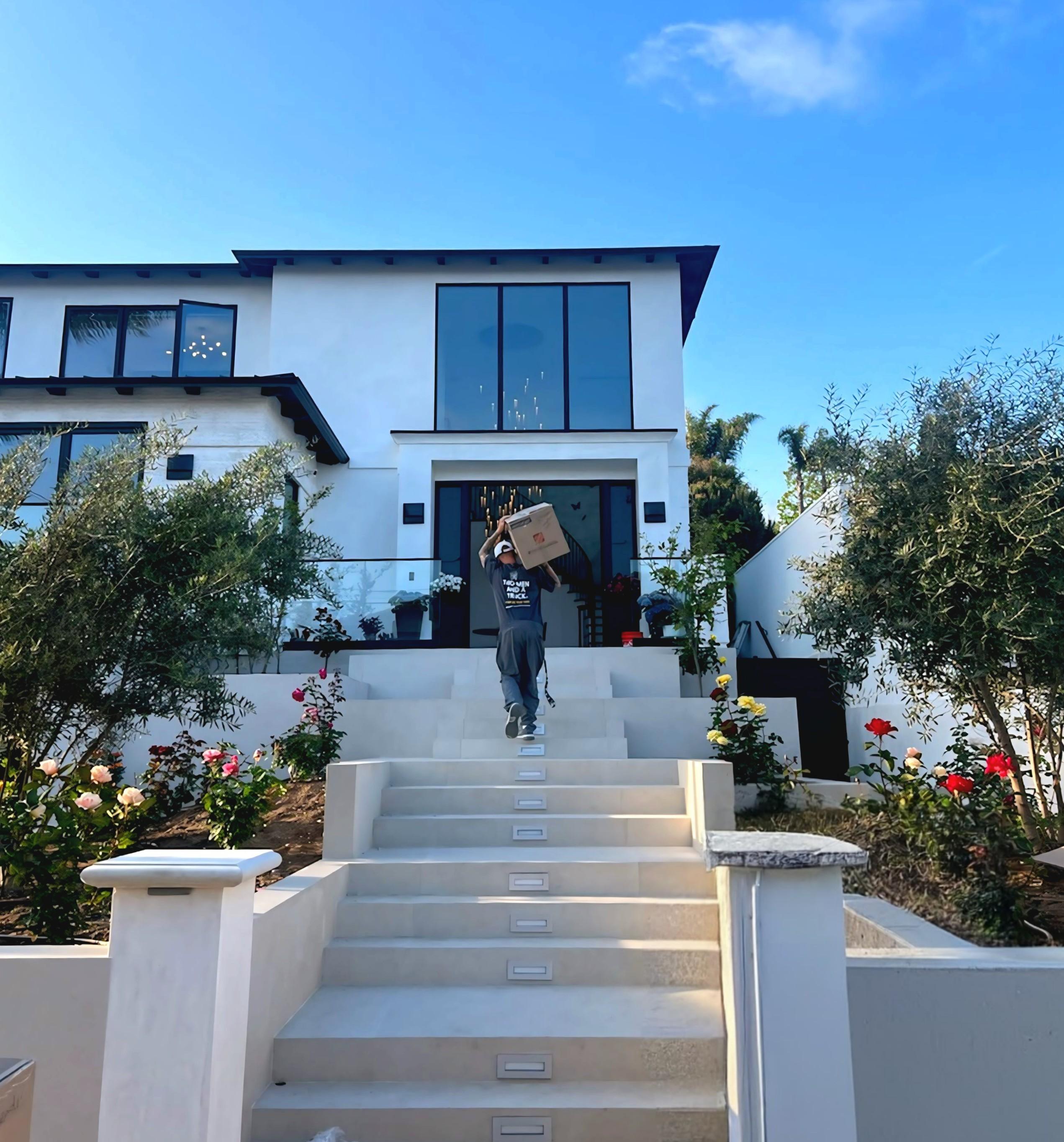 Mover carrying up stairs 