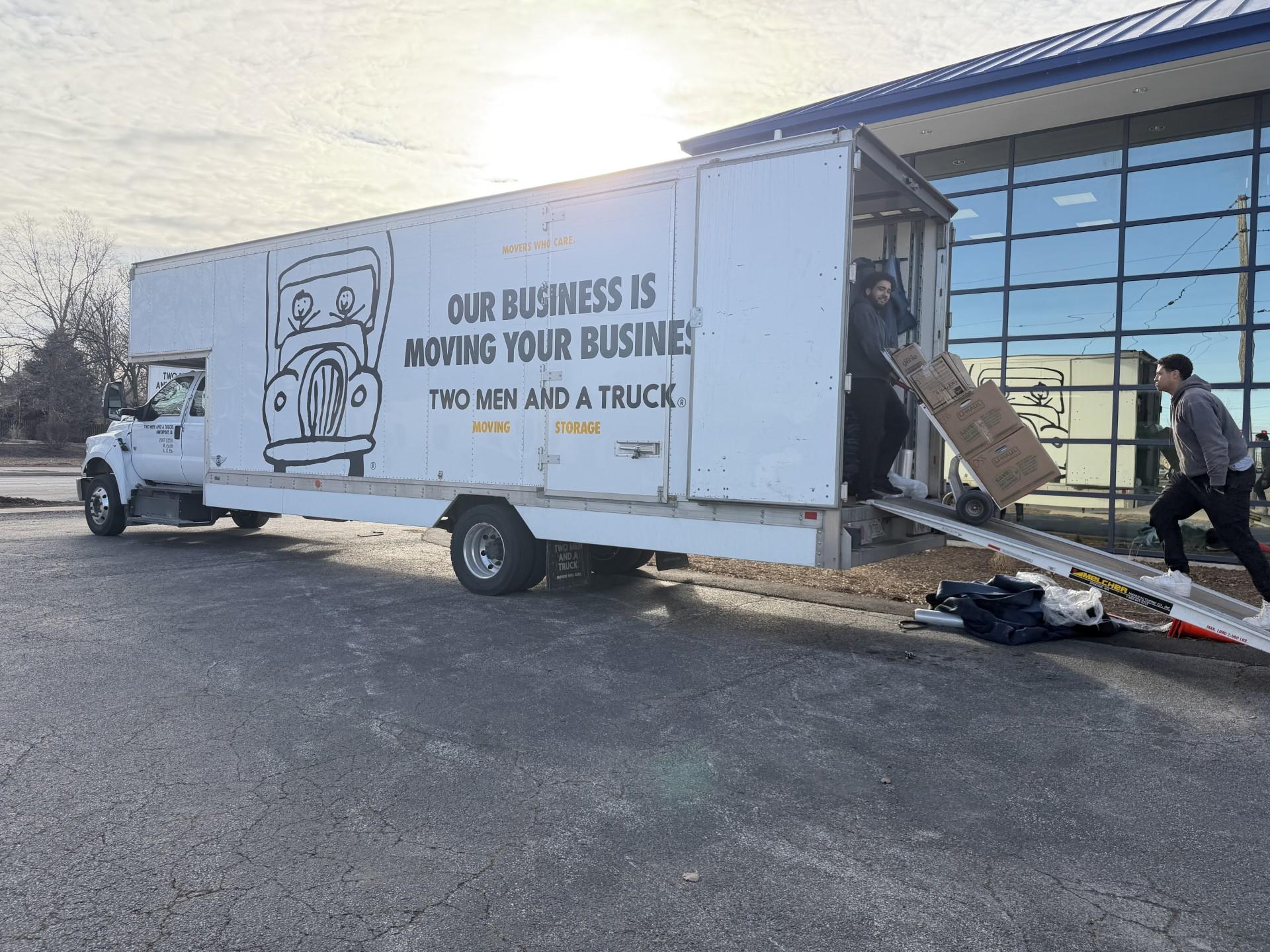 truck parked in front of a business