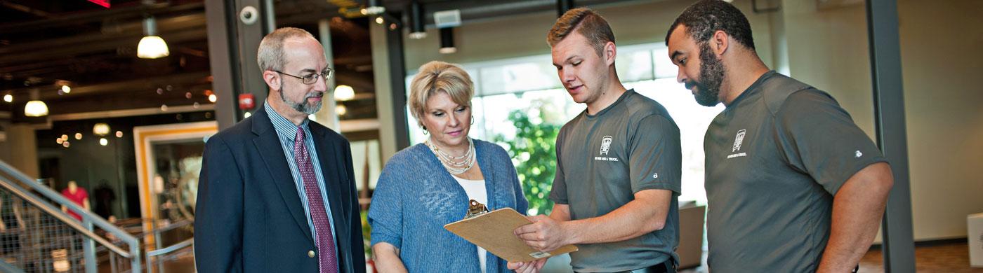 Woman talking with moving team