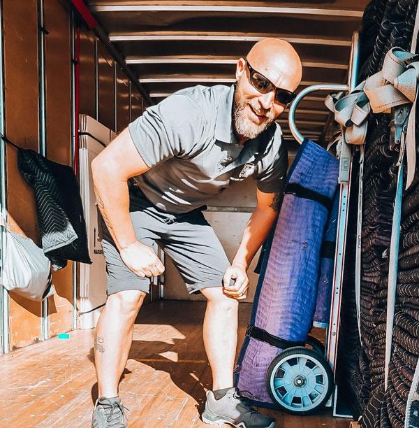 mover keith in the back of our truck with equipment