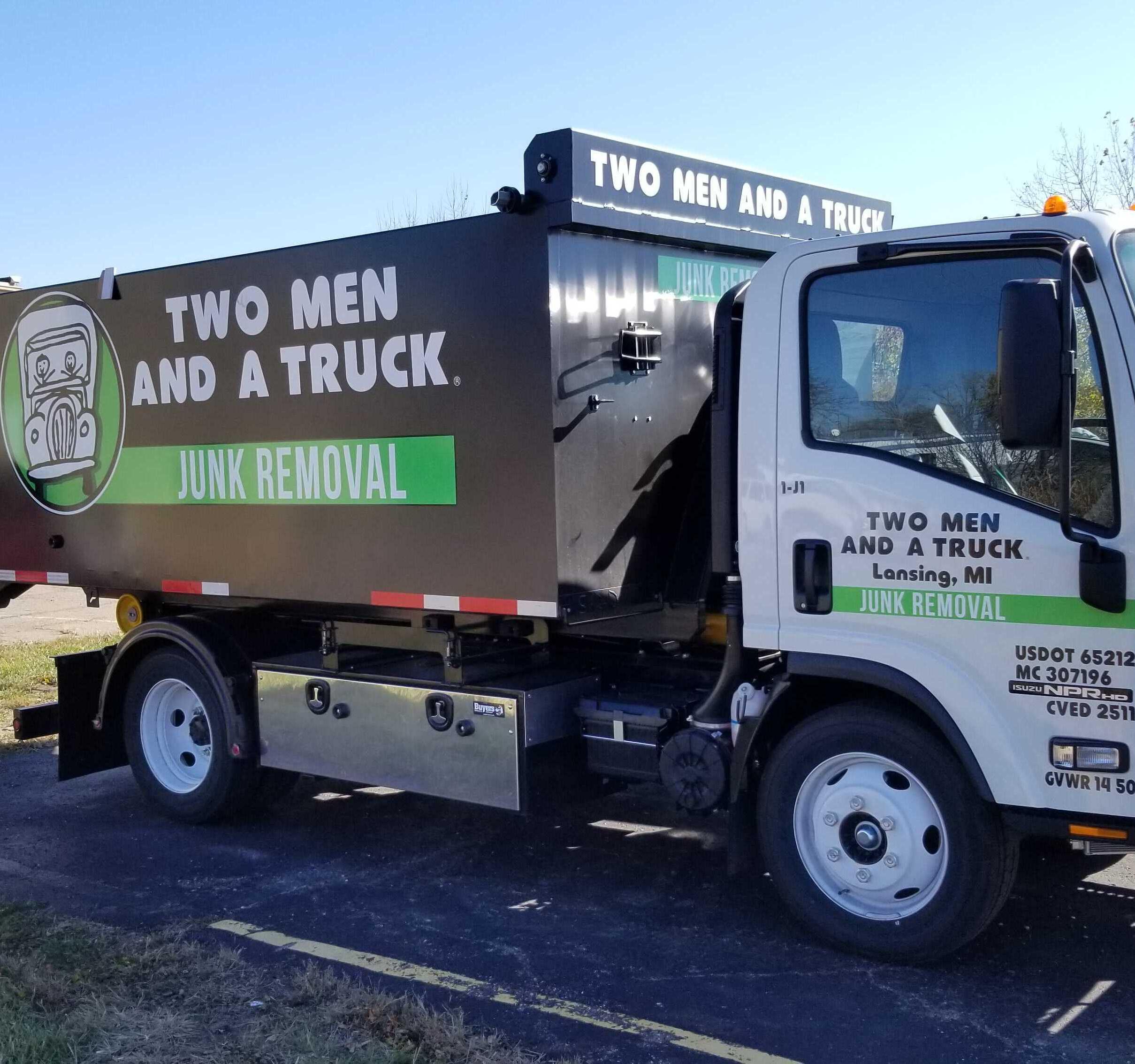 Picture of Blue and Green Lansing Dedicated Junk Only Truck