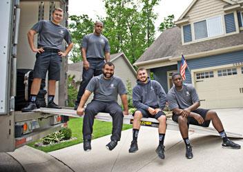 moving company professionals with two men and a truck