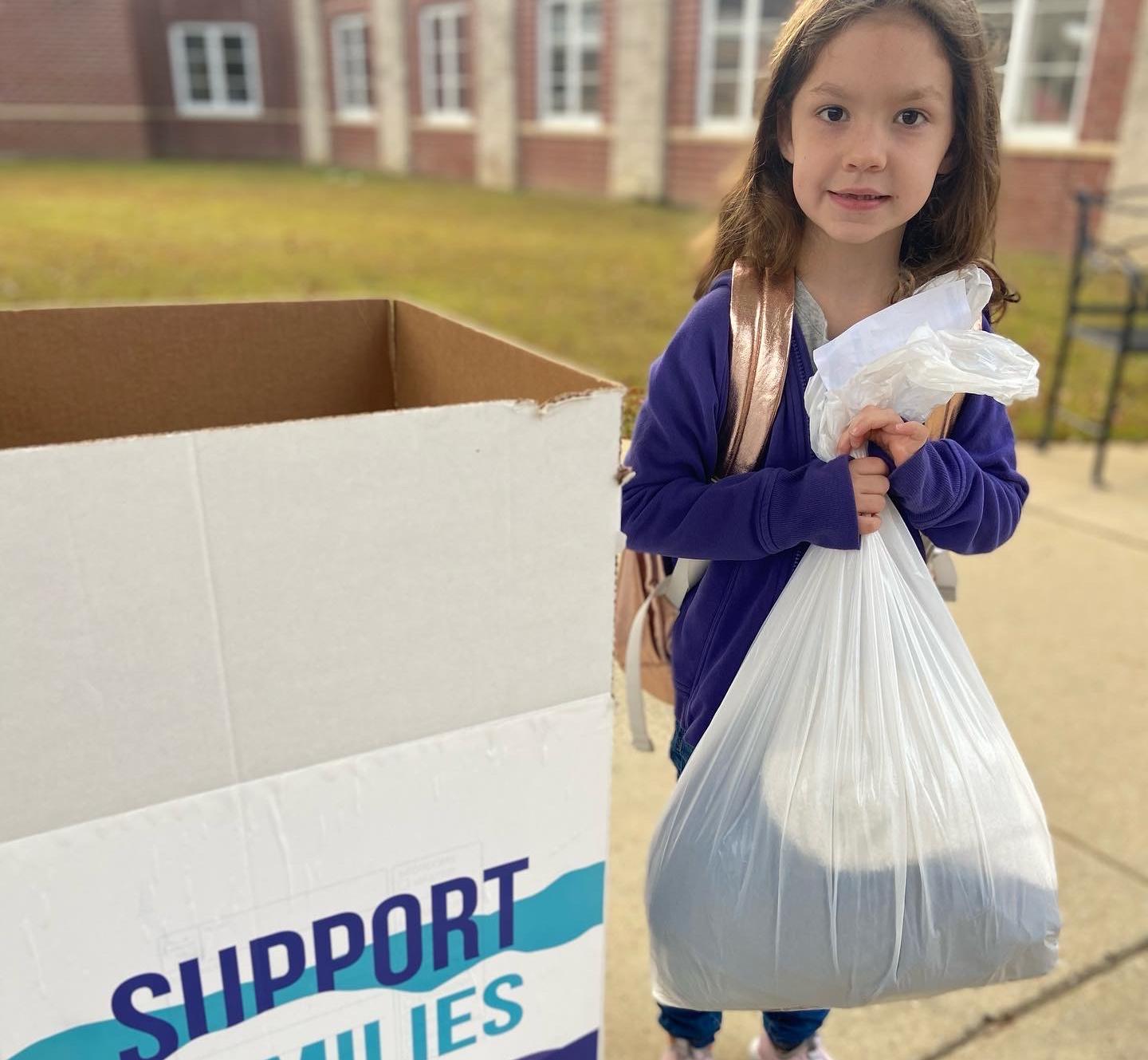 Two Men and a Truck Birmingham hosts Truckload of Warmth at Vestavia Hills Elementary School 