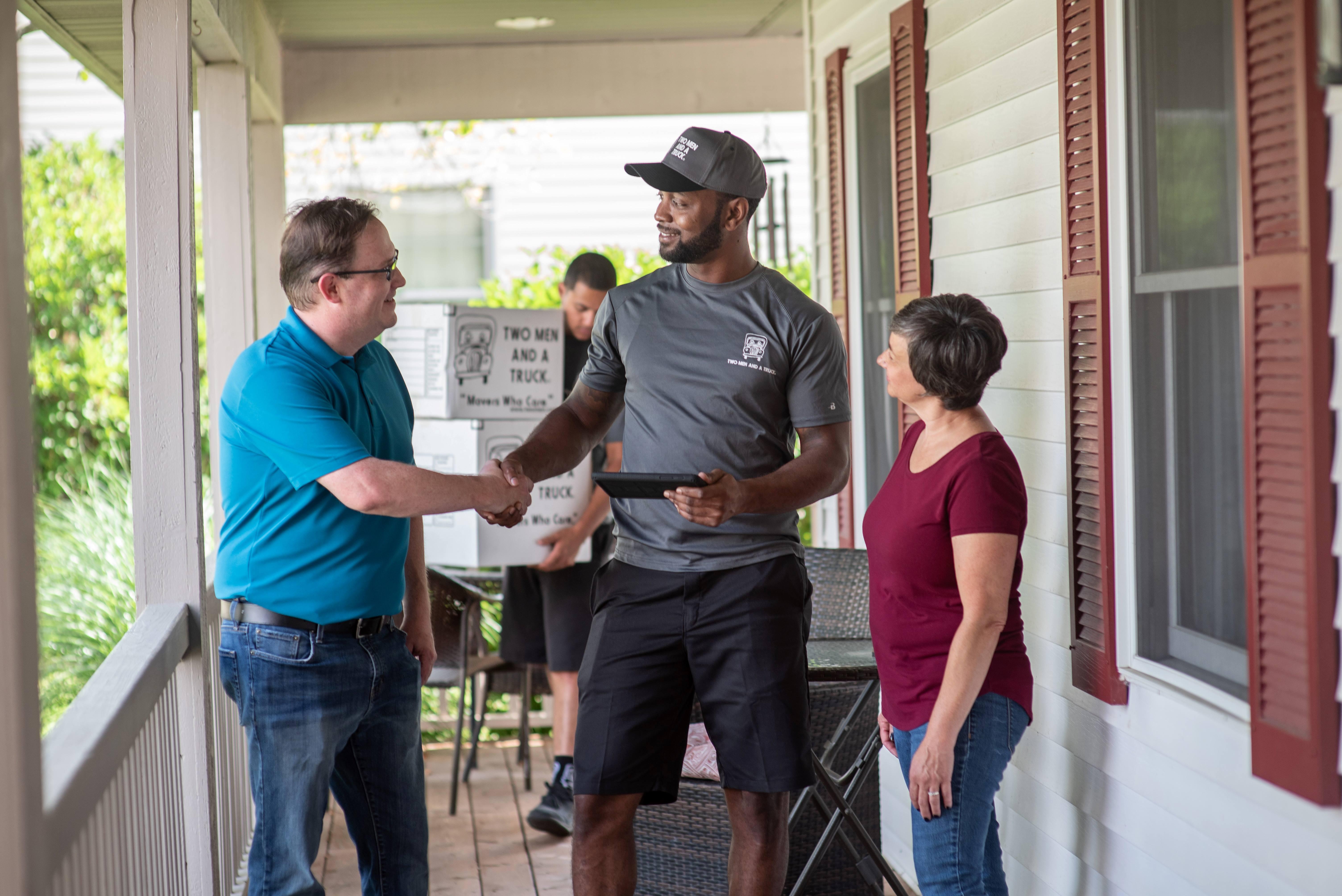 Movers talking to customers