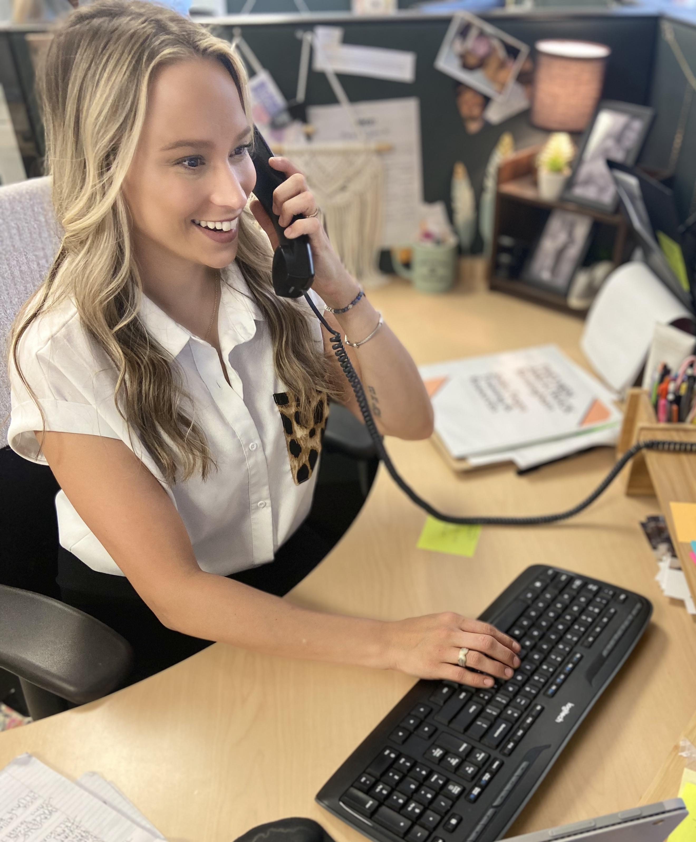 Taylor, Birmingham moving specialist on the phone with a customer.