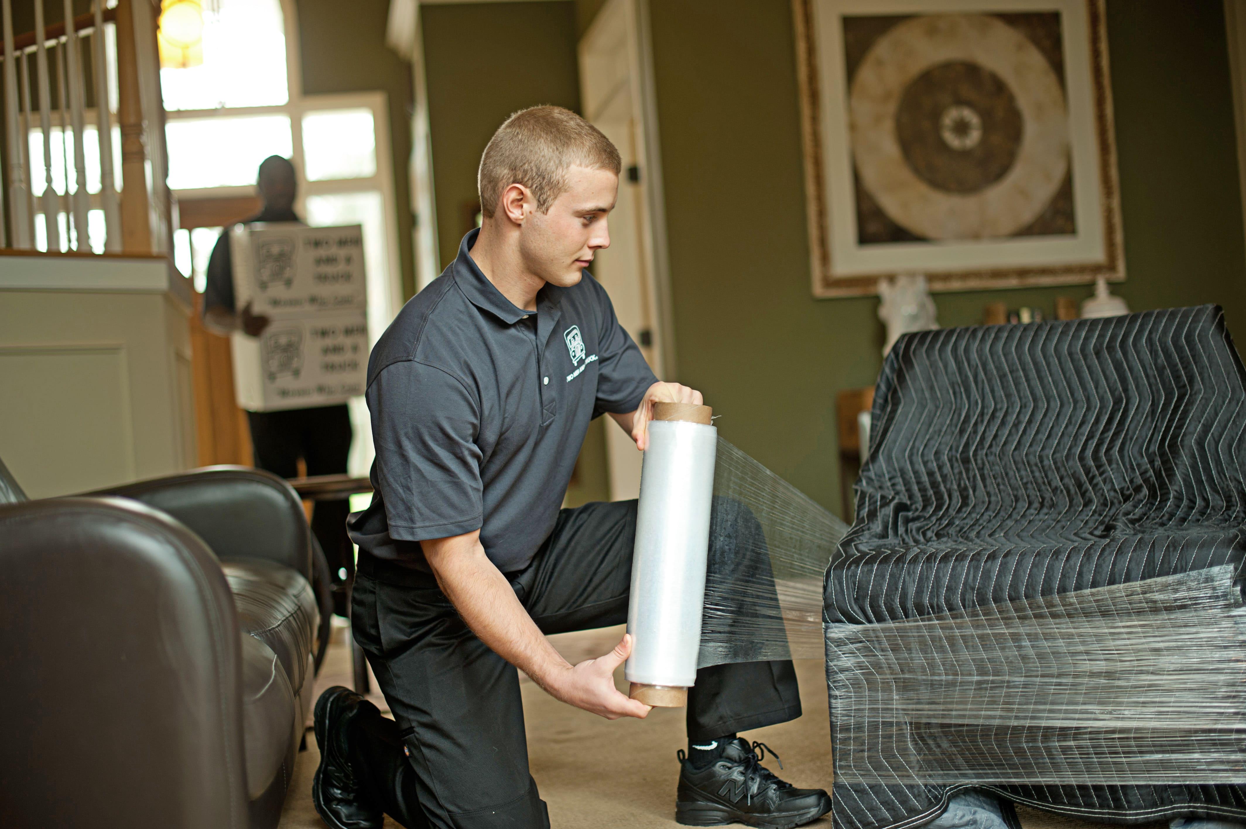 mover wrapping furniture with padding