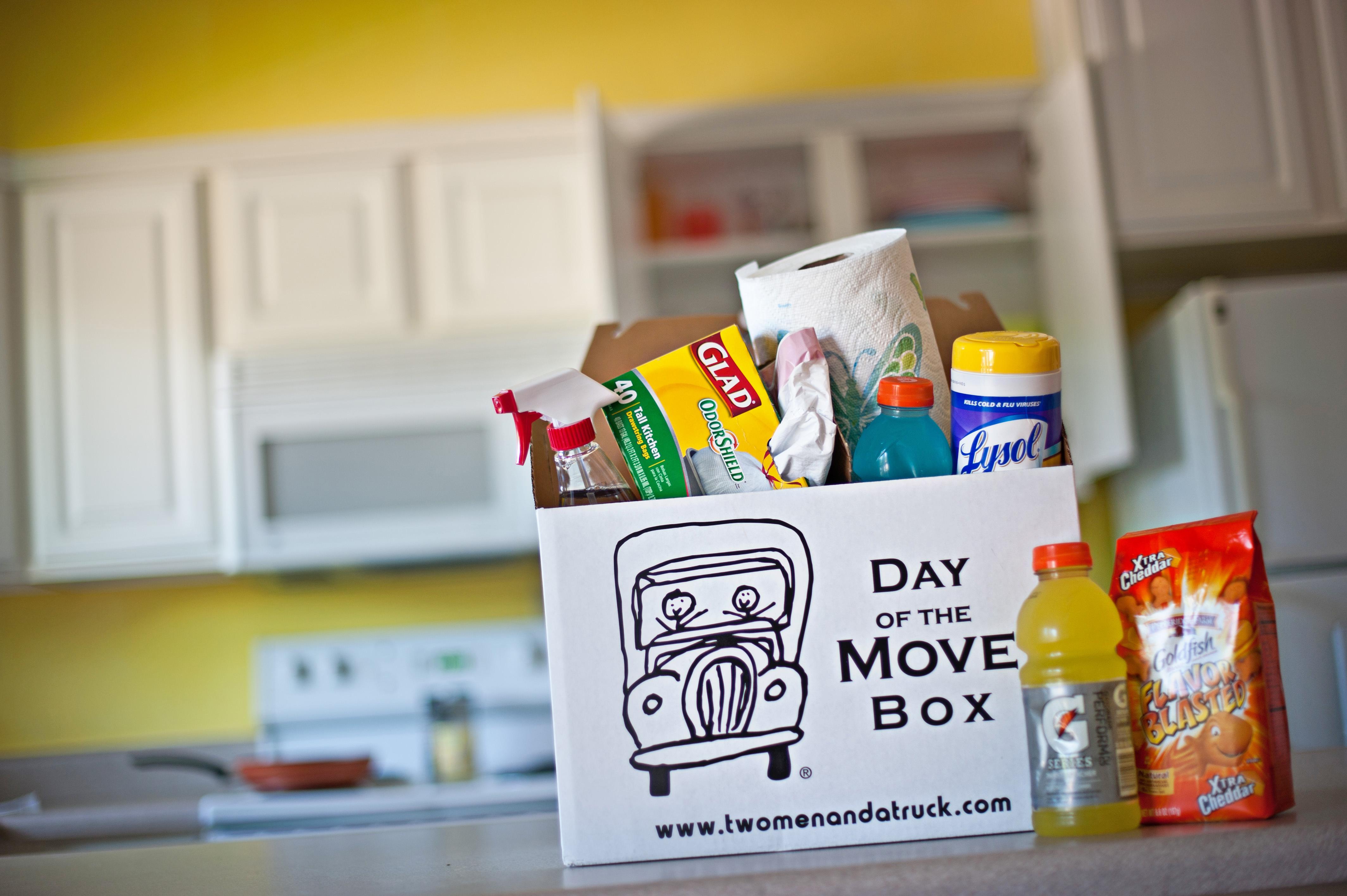 Cleaning supplies in a Two Men and a Truck box