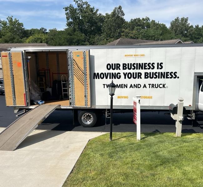 Business truck outside home