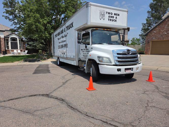 moving truck parked in a neighborhood